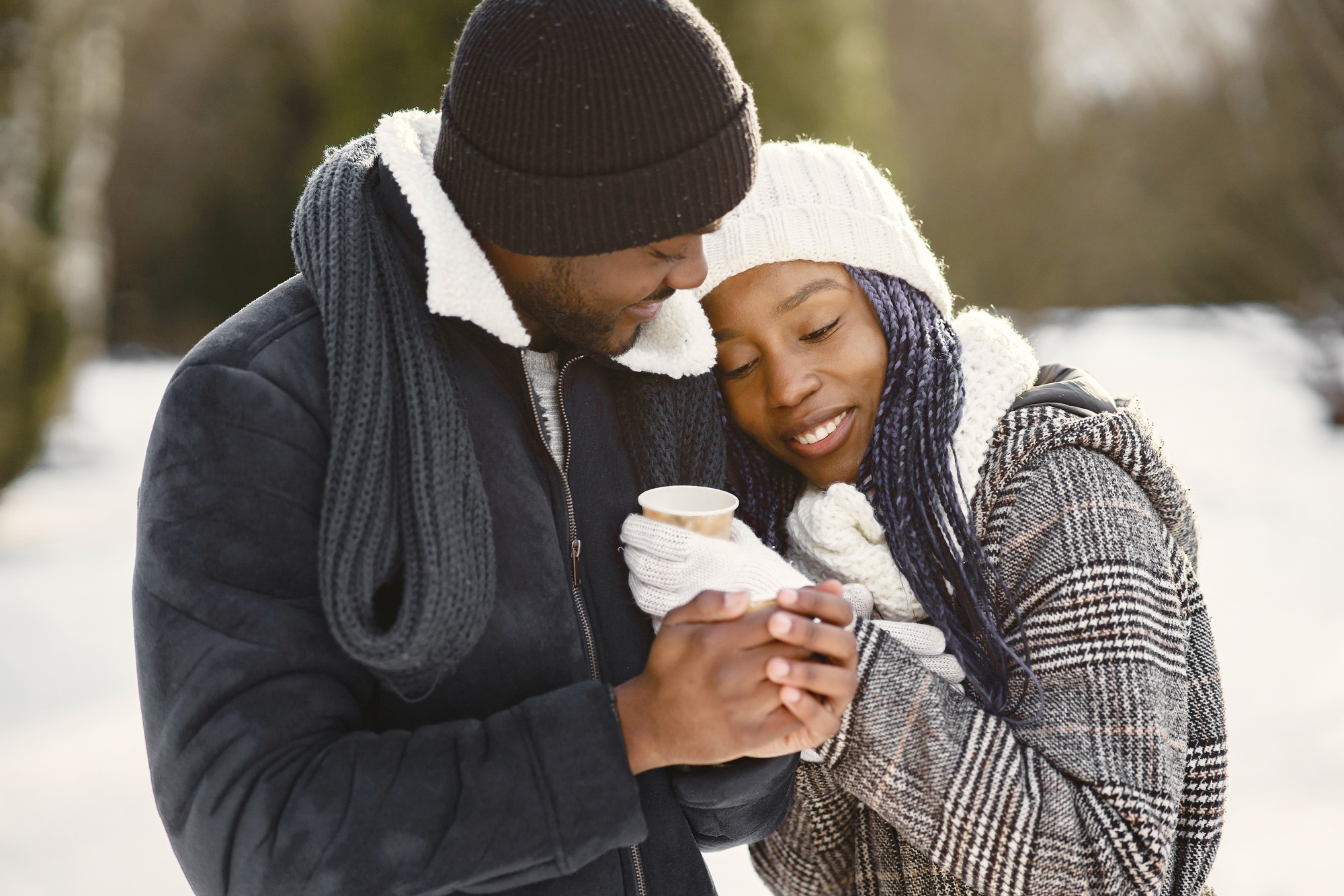 Christian couple sharing a warm drink